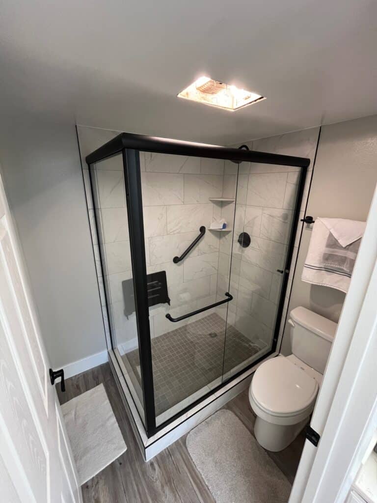 black framed sliding shower door slc ut